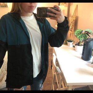 blue and black windbreaker jacket